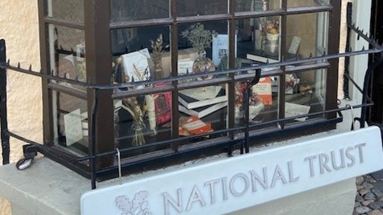 Shop window of Tabitha Twitchit's bookshop in Hawkshead, Cumbria